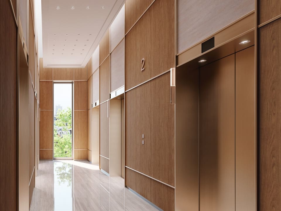 Elevator lobby wall and doors refinished in 3M DI-NOC wood and dark metal, visualized by Epic