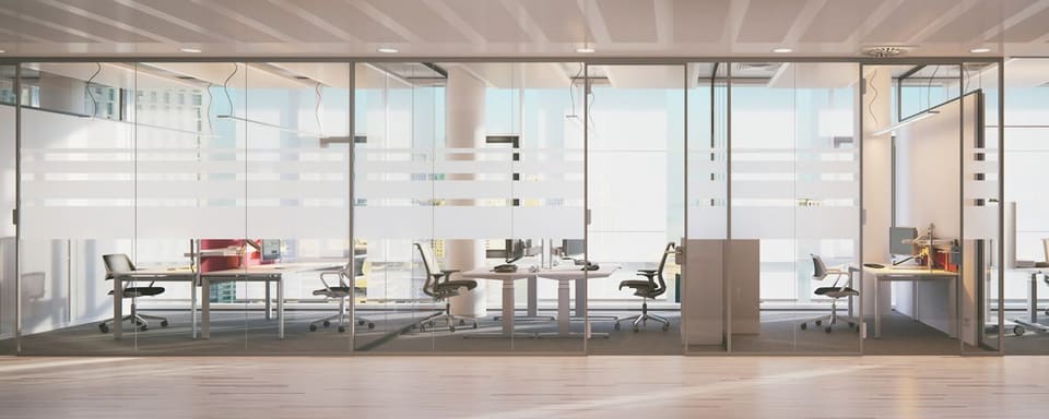 Concept rendering of a glass conference area with a horizontal frosted band across the glass